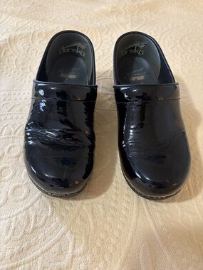 Dansko Black Patent Leather Clogs